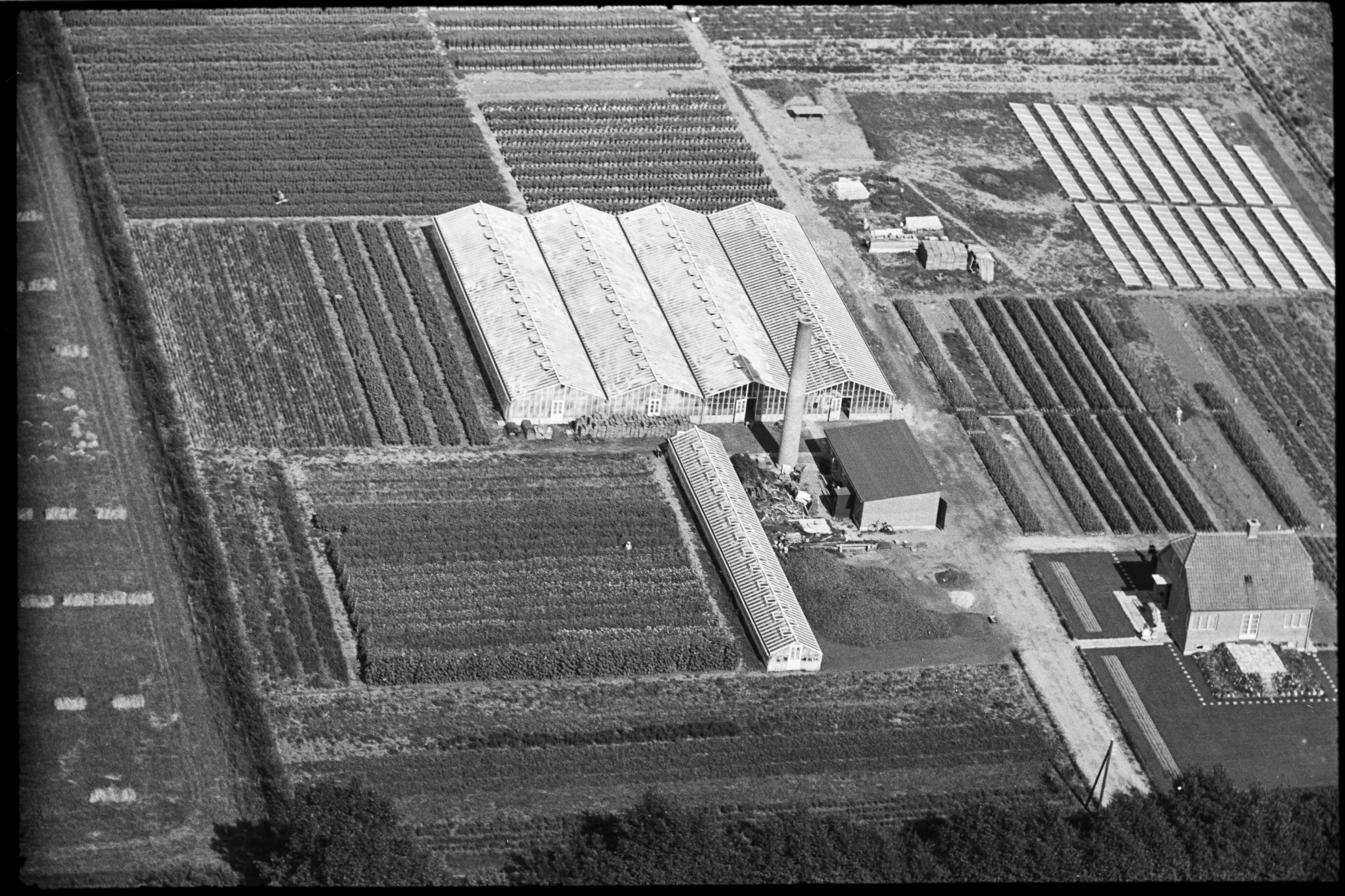 Skråfoto fra 1936-1938 taget 220 meter fra Bymuren 31, 4. th